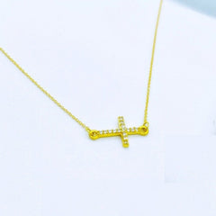 Collar cruz horizontal en oro 18k con circonitas para mujer