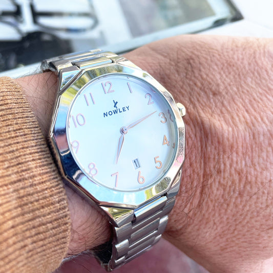 Reloj Nowley prisma plano acero dial rosado para hombre