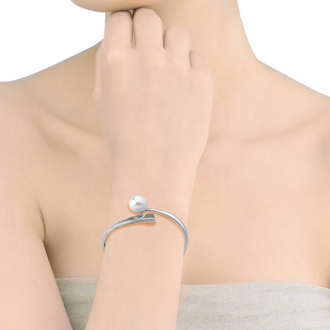 Pulsera rígida de plata y perla blanca MAJORICA Clave al Sol para mujer