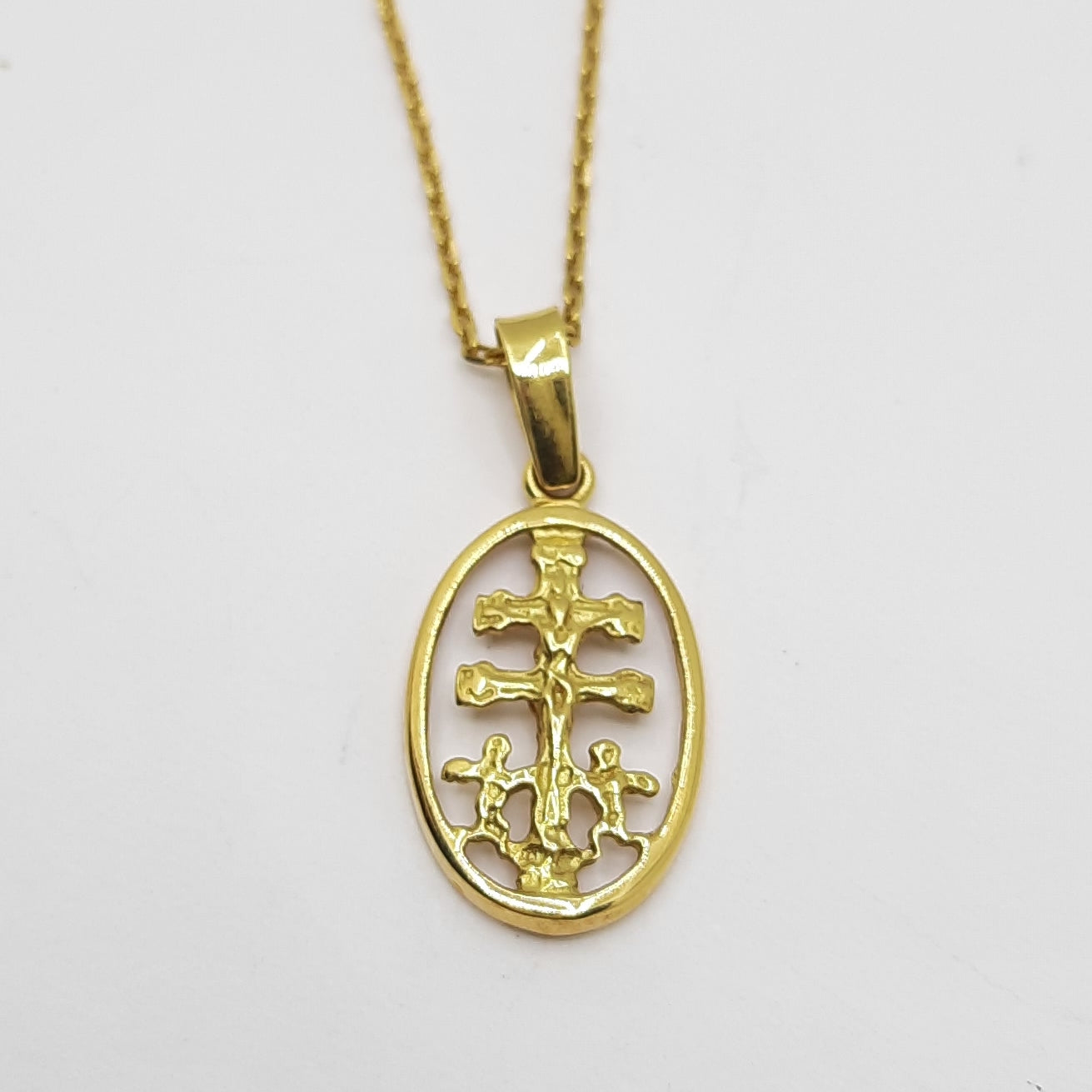 Colgante de oro 18k cruz de caravaca para mujer